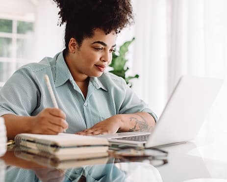 woman looking at computer